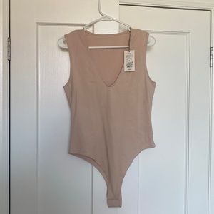 NWT Beige bodysuit